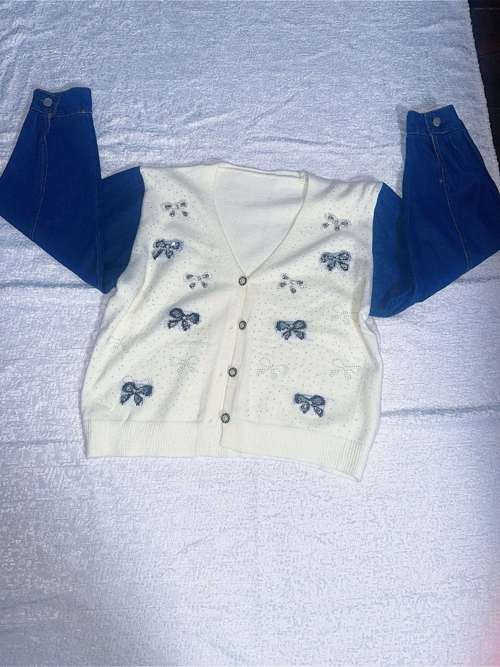 White Knit sweater with Blue Bow Embroidery and Blue Sleeves
